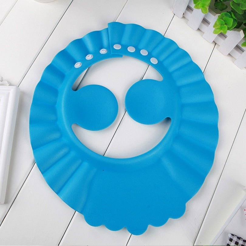 Visière chapeau pour douche bébé I ShampooCap™ - Guessca